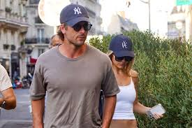 Glen Powell and Girlfriend Michelle Randolph Share a Steamy Kiss in Paris