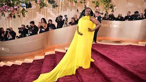 Wunmi Mosaku Reveals Pregnancy in a Radiant Yellow Gown at the Golden Globes