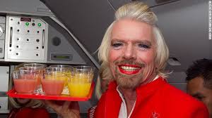 Sir Richard Branson worked as an AirAsia X flight attendant on Sunday after losing a bet to AirAsia CEO Tony Fernandes. - 130513122913-branson-flight-attendant1-horizontal-gallery