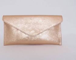 Image of metallic rose gold leather clutch