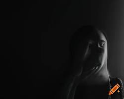 Image of person expressing sadness