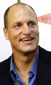 Actor Woody Harrelson is likening a paparazzo he tussled with at a New York airport to one of the undead zombies he battled in his most recent film. - People_Woody_Harrelson_NY12285x469