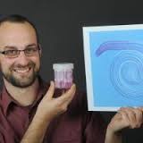 Dr Daniel Leduc, a University of Otago postdoctoral researcher, holds nematode worm samples from the Otago Peninsula and a photograph of a previously ... - dr_daniel_leduc_a_university_of_otago_postdoctoral_1563297490