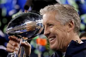 Coach Pete Carroll poses with the Lombardi Trophy after the Seahawks&#39; Super Bowl win. - 9819692