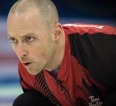 Team Canada&#39;s Nolan Thiessen concentrates on his shot during Saturday&#39;s loss to Norway. (Photo, World Curling Federation / Céline Stucki) - WMCC2014-9531