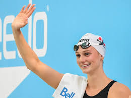 Summer McIntosh breaks longest-standing world record in women’s swimming