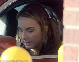 Their pride and joy: The pair have 17-year-old daughter Hailee Scott, seen at a drive thru ATM last week - article-2511755-198C8C7000000578-721_634x496