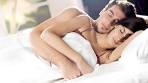 Happy Couple In Bed -