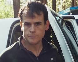 Image of Matthew Muller being arrested by police