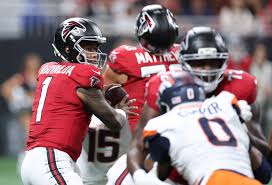 Atlanta Falcons logo and depth chart graphic showing rookie starters