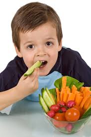 Image result for pictures of a child eating vegetables