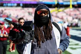 Former Seahawks Player Marshawn Lynch Is on the Sidelines for Super Bowl 2026— as a Cameraman