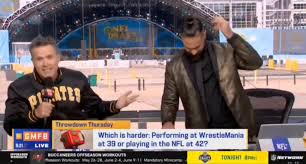 Are we gonna have to do this corny ‘WWE guy makes a scene’ thing all year long now?