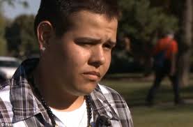 Shocked: 16-year-old Manuel Vigil said he uses the beads for protection and has no affiliation to any gang. &#39;I use them for prayer,&#39; he told kdvr.com. - article-2203903-1509954E000005DC-514_634x417