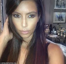 They&#39;re back! Kim Kardashian had her favourite hair extensions put back in yesterday, and shared the look with her fans via Twitter - article-2183658-1461611D000005DC-381_634x617