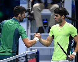 Image de Djokovic and Alcaraz shaking hands after a match