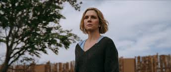 Rhea Seehorn holding her first Emmy Award for Pluribus