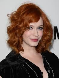 Christina Hendricks&#39; berry pink looks great with her red hair because the lipstick&#39;s purplish tones don&#39;t compete with her hair color, but contrast with it. - Christina_Hendricks