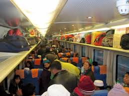 Image result for people in china getting squished into a train