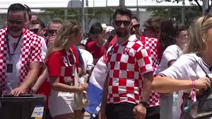 Excited Croatian fans arrive for World Cup game against England in Texas