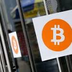 Bitcoin plunges, Coinbase temporarily halts