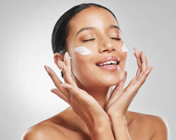 Image of applying face primer
