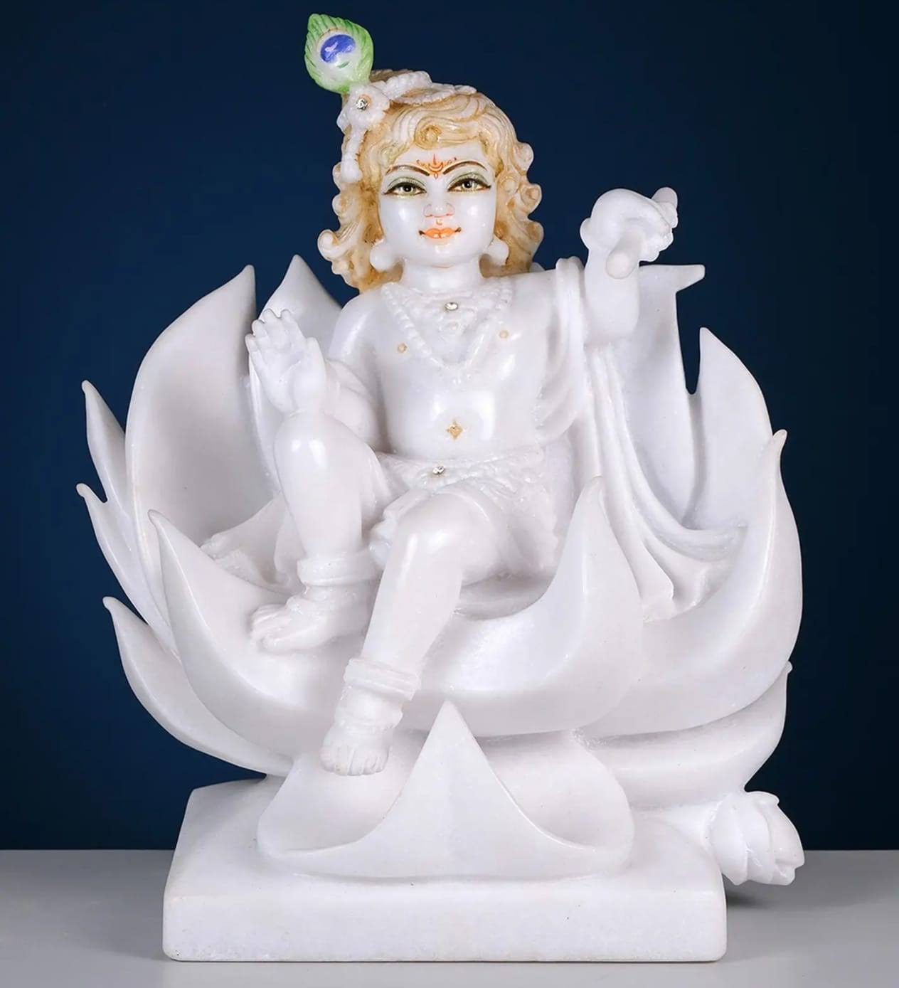 Marble laddu gopal statue