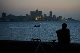 Cubans sleep on seaside boardwalk to seek relief from crippling blackouts and summer heat