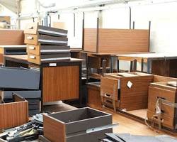 Image of old office furniture being recycled