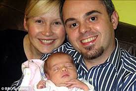 Happy family: Pawel Pyrchala with wife Anita and new daughter Emily who was ... - article-2038559-0DF1B98700000578-411_468x313