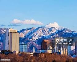 Image of Chicago skyline and Salt Lake City mountains