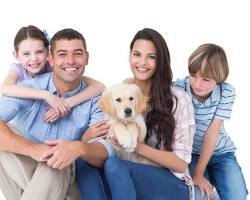 Image of happy family with a puppy