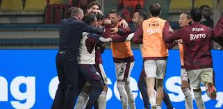 Torino FC players celebrating after scoring against Parma during the Serie A match.