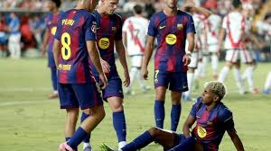 First slip for champions Barca in Rayo draw