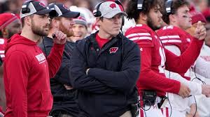Where is former Wisconsin Badgers coach Jim Leonhard interviewing in the NFL?