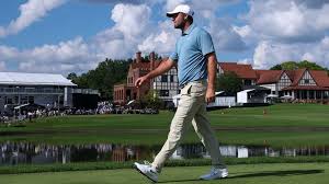 Scottie Scheffler and Viktor Hovland competing in the Tour Championship at East Lake