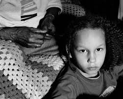 From the series, &quot;The Notion of. “Grandma Ruby Braiding JC&#39;s Hair.” From the series, “The Notion of Family.” 2007.Credit LaToya Ruby Frazier - 20140220-lens-frazier-slide-VI7C-blog480