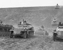 Image of German tanks advancing in a concentrated formation