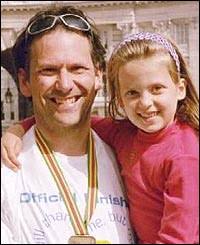 Karl Cadman celebrates with this daughter in 2003 - _40995115_fatherwin_200x245