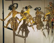 Image of Wayang Kulit puppets and performance