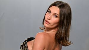 Hailey Bieber Leads Summer's Minimalist Swimwear Trend with Calzedonia Campaign