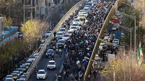 Iranian protesters clash with security forces as tear gas fills Tehran streets amid nationwide unrest