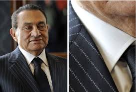 Whoever made the suit, however, spells it like &quot;Hosny Mubarak&quot; (via Buzzfeed; photo via Tumblr). hosni-mubarak-pinstripes-name - hosni-mubarak-pinstripes-name