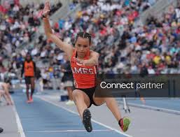 Licensable picture: Ames’ Sophia Hatcher lands during 4A girls long jump in the Day-two of the Iowa state high school co-ed track and field at Drake