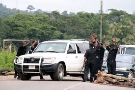 Image result for nigerian police checking particulars illegal