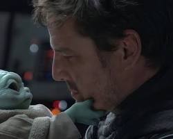 Image of Pedro Pascal and Yoda the terrier mix