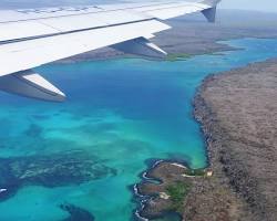 Image of plane flying over the Galapagos Islands