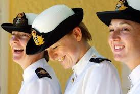 Making waves … from left, Christine Senini, Olga Poberezovska and Angela Pitts celebrate their graduation from naval officer training. - navy_wideweb__470x316,0