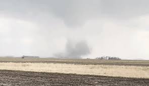 Tornado Whips Up Dust While Spinning Close to Road