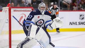 Sources -- Devils in advanced talks to acquire G Hellebuyck from Jets - ESPN